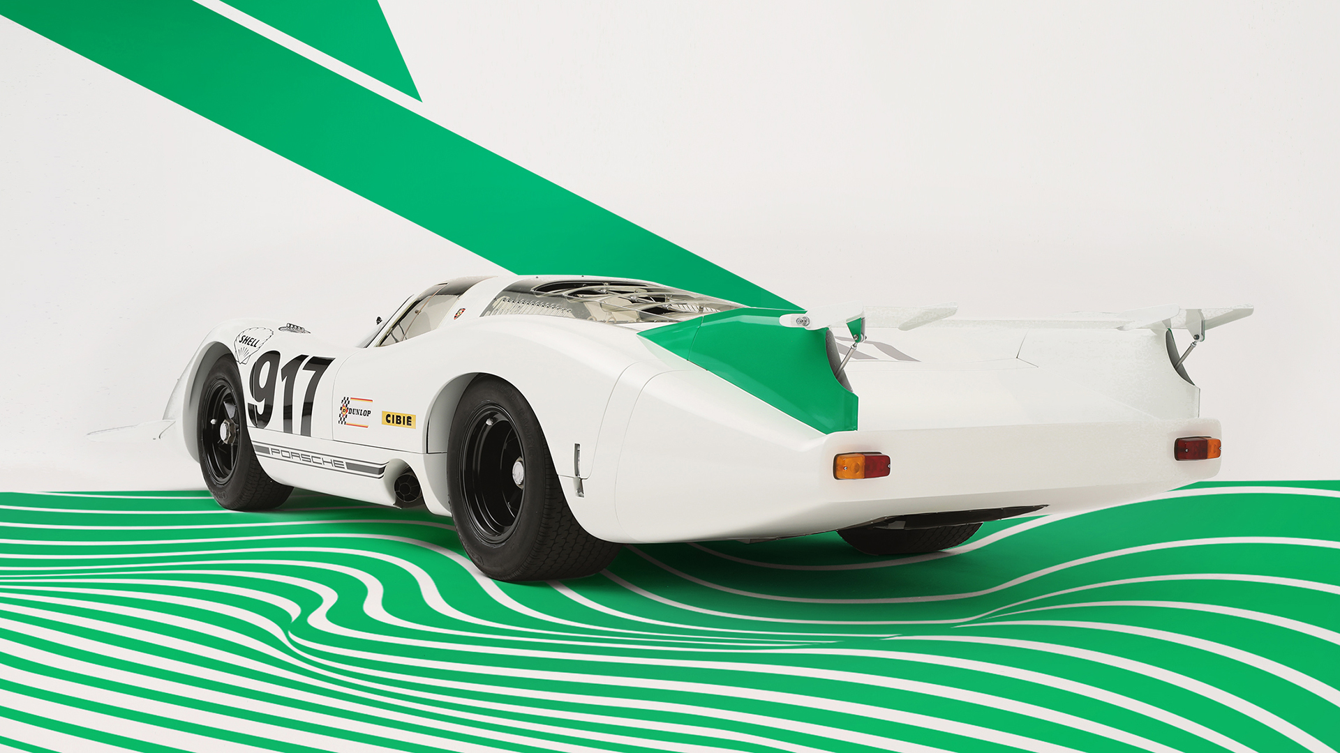Porsche 917-001 in its green-and-white color scheme, photographed for Porsche’s 2019 livery retrospective. Contemporary editorial photograph, not a 1969 race photograph. Photo © Porsche AG / Porsche Newsroom; official media-reporting imagery.