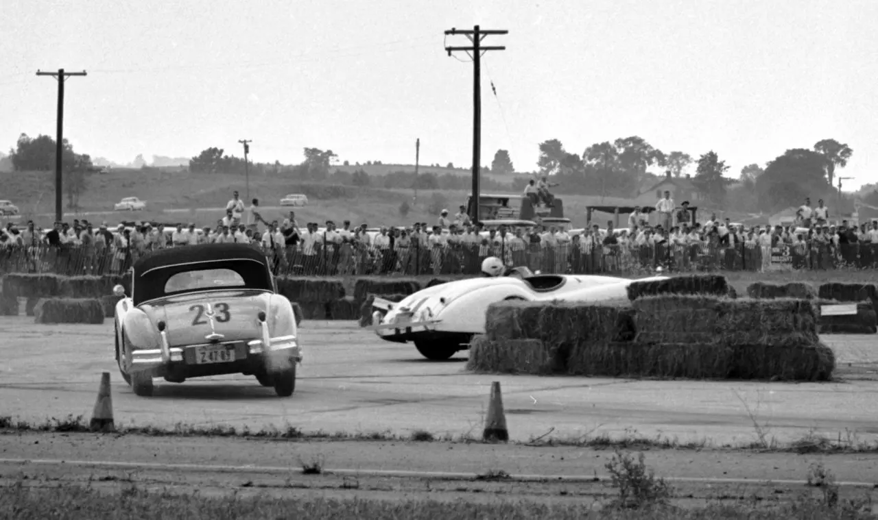 The red number 23 Jaguar in competition at Montgomery in 1956. Period photograph by Ozzie Lyons, courtesy Pete Lyons.