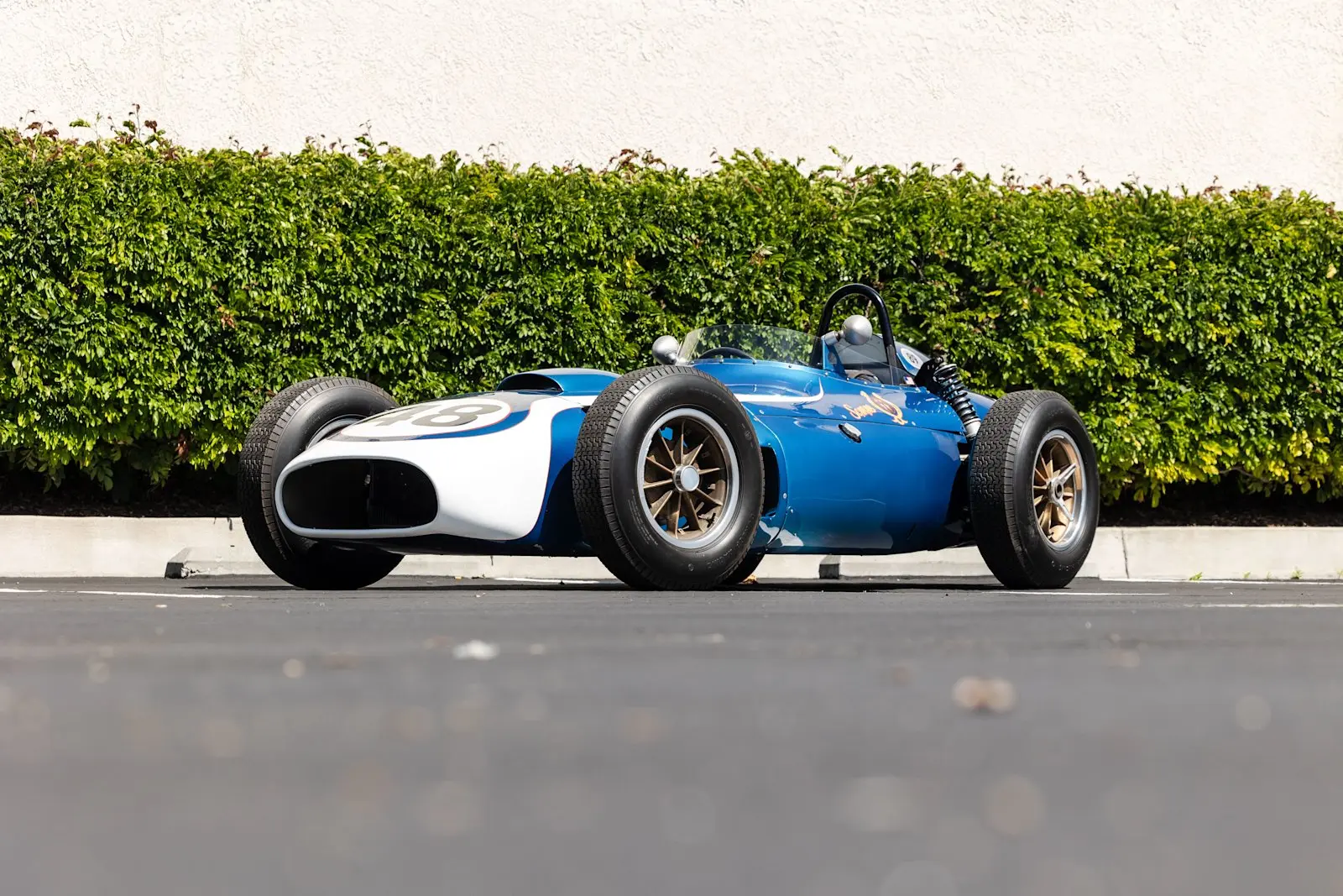 The low nose and metallic blue-and-white finish disguised a conventional front-engine layout just as Formula One moved decisively toward rear-engine cars. Photography courtesy Mecum Auctions.